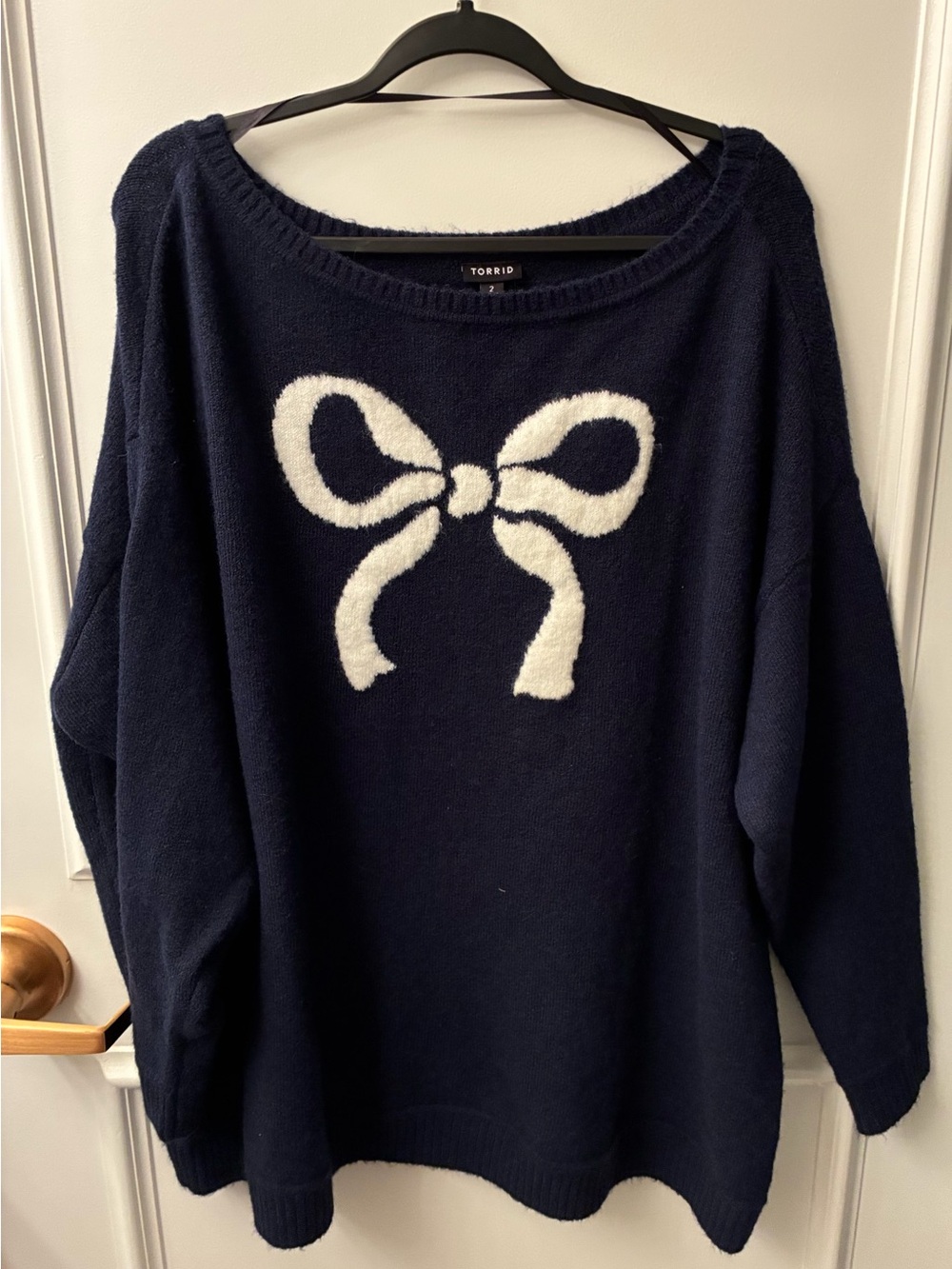 torrid navy sweater with white bow front